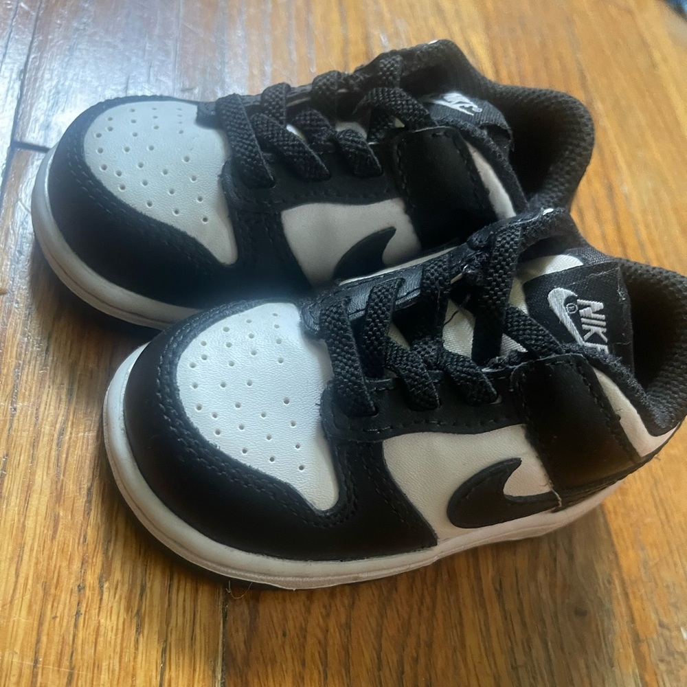 Black and white toddler Nike dunks